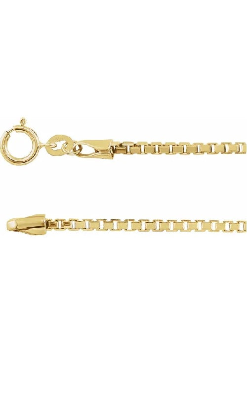 Gold chain with a lobster clasp on a white background.