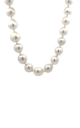 Close-up of a white pearls necklace