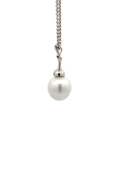 Silver necklace with white pearl pendant with diamond accents