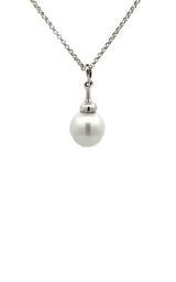 Silver necklace with white pearl pendant with diamond accents