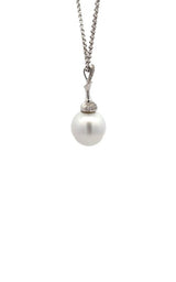 Silver necklace with white pearl pendant with diamond accents