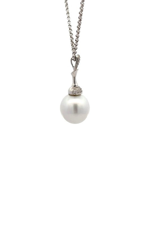 Silver necklace with white pearl pendant with diamond accents