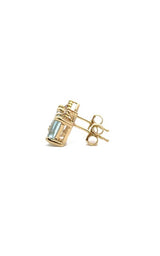 Gold stud earrings with aquamarine and diamond accent