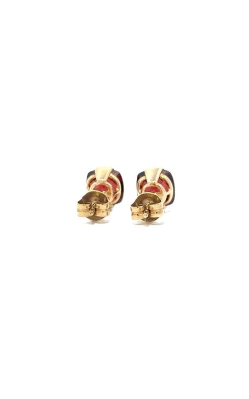  Pair of gold stud earrings with square-cut red garnet gemstones.