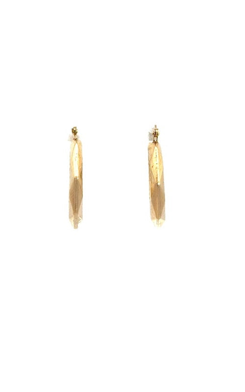 Pair of gold hoop earrings with a hexagonal shape and textured surface.