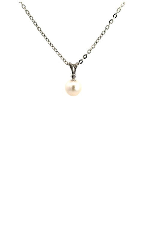 Side view of silver necklace with white pearl pendant with diamond accent