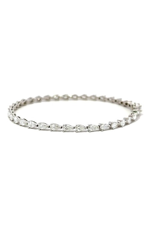 Silver tennis bracelet with pear-shaped diamonds.