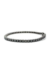 Black diamond tennis bracelet with round-cut stones.