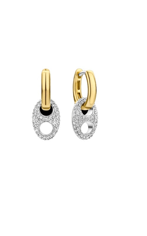 Two-tone gold hoop earrings with dangling circular pendants adorned with pavé diamonds and black accents.