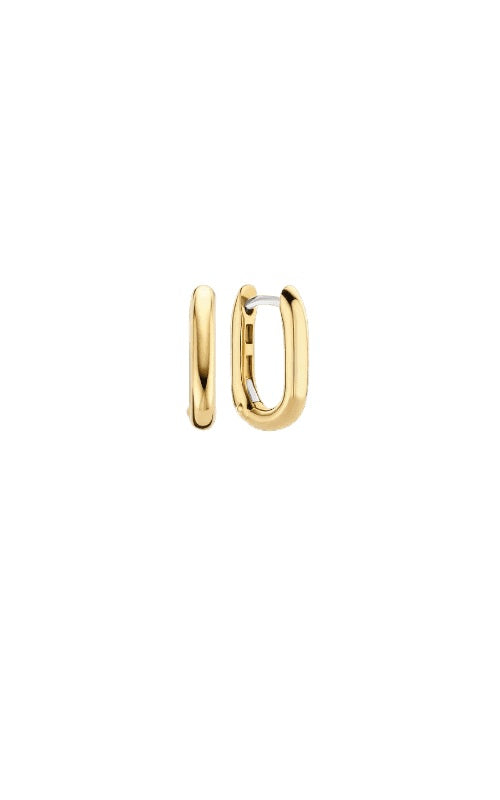 Gold huggie earrings on a white background.