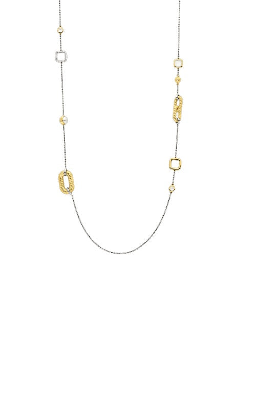 Long silver chain necklace with alternating gold and silver geometric shapes.