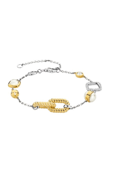 Silver bracelet with a mix of gold-plated and silver-plated links, featuring a pearl, a square-cut stone, a round stone, and a twisted gold-plated link.