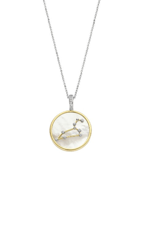 Silver chain necklace with a circular pendant featuring the Libra zodiac sign in gold and diamonds.