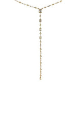 Gold lariat necklace with multiple rectangular and round gemstones.