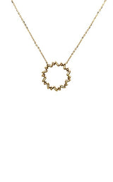 Gold necklace with a circular pendant featuring a geometric design of baguette-cut diamonds.