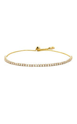 Gold adjustable bracelet with a sliding clasp and multiple small beads.