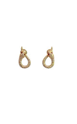 Gold snake-shaped stud earrings with diamond accents and ruby eyes.