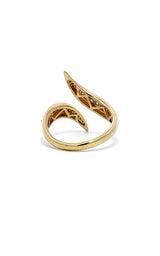 Gold ring with diamond accents, featuring a curved, open-ended design.