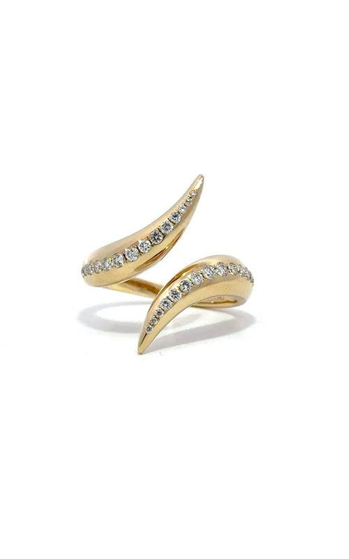 Gold ring with diamond accents, featuring a curved, open-ended design.