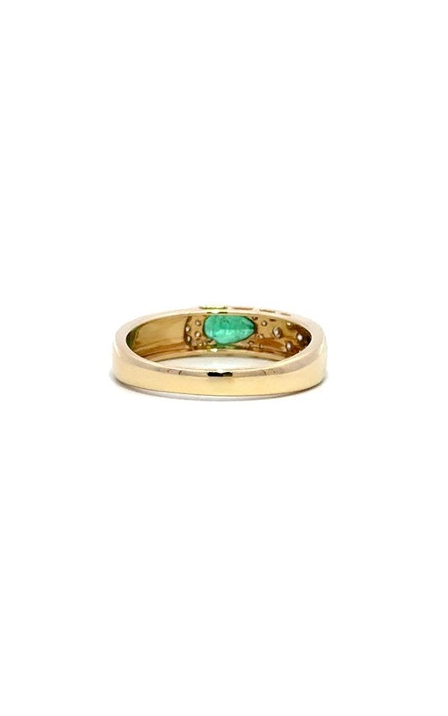 Gold ring band with a pear-shaped emerald surrounded by smaller diamonds.