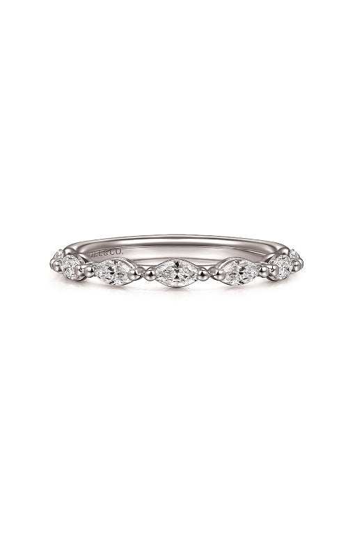 Silver wedding band featuring a marquise shaped diamonds