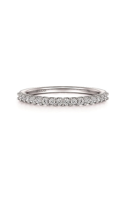 Silver diamond band ring on a white background.