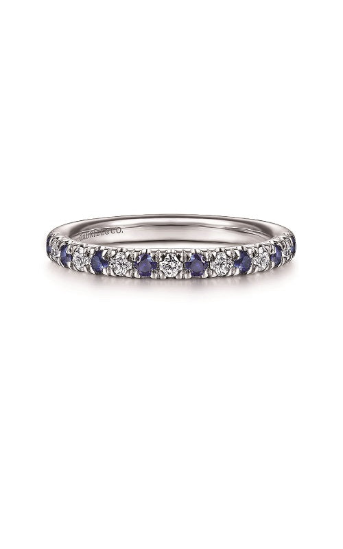 White gold eternity band with alternating round sapphires and diamonds