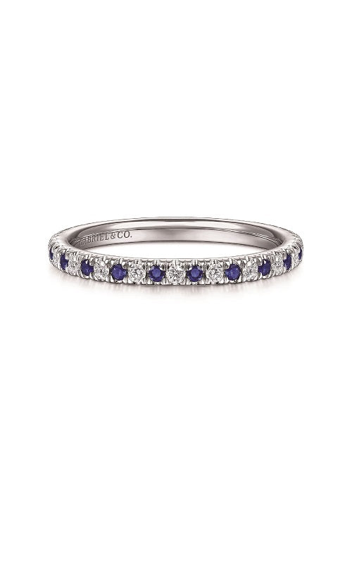 White gold eternity band with alternating round sapphires and diamonds