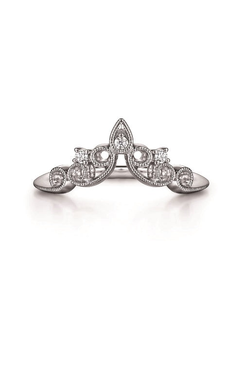 Silver wedding band with a filigree design featuring round diamonds and milgrain detailing. The band has a pointed, crown-like shape.