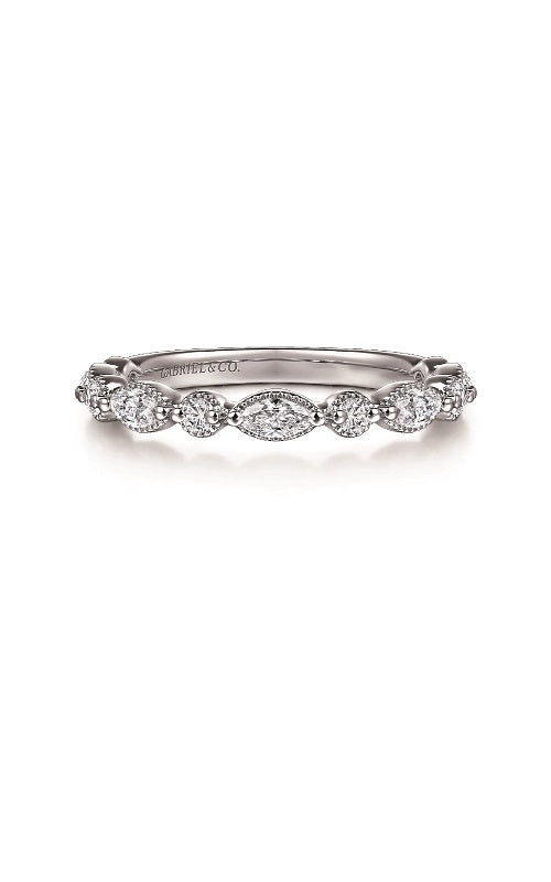 Silver band with five oval-shaped diamonds and smaller accent diamonds.