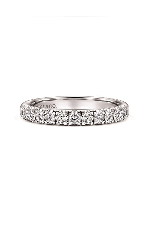 Silver ring with a diamond in pave setting  on a white background.