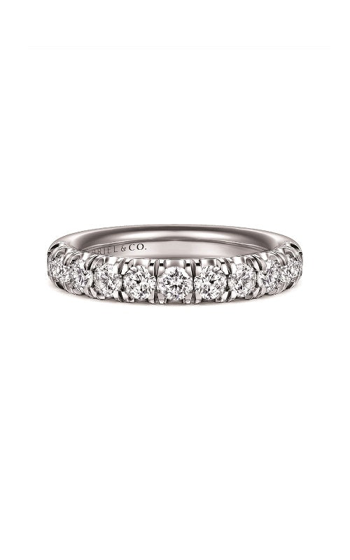 Silver ring with a diamond in pave setting  on a white background.