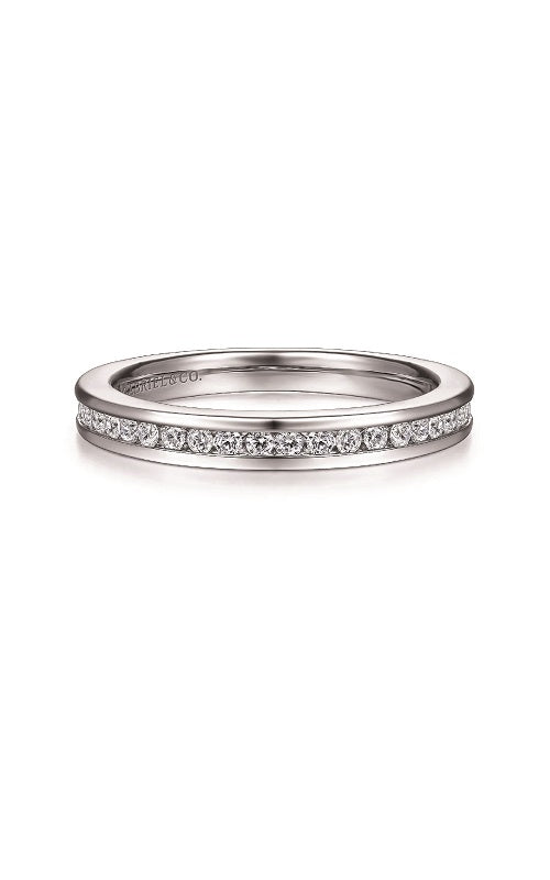 Silver ring with a diamond in channel setting  on a white background.