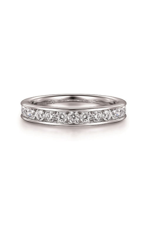 Silver ring with a diamond in channel setting  on a white background.