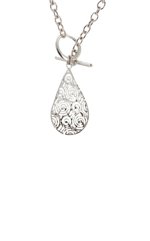  Silver toggle necklace with a large, teardrop-shaped pendant featuring intricate swirl cutouts.