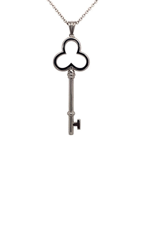 Silver necklace with a key pendant on a white background